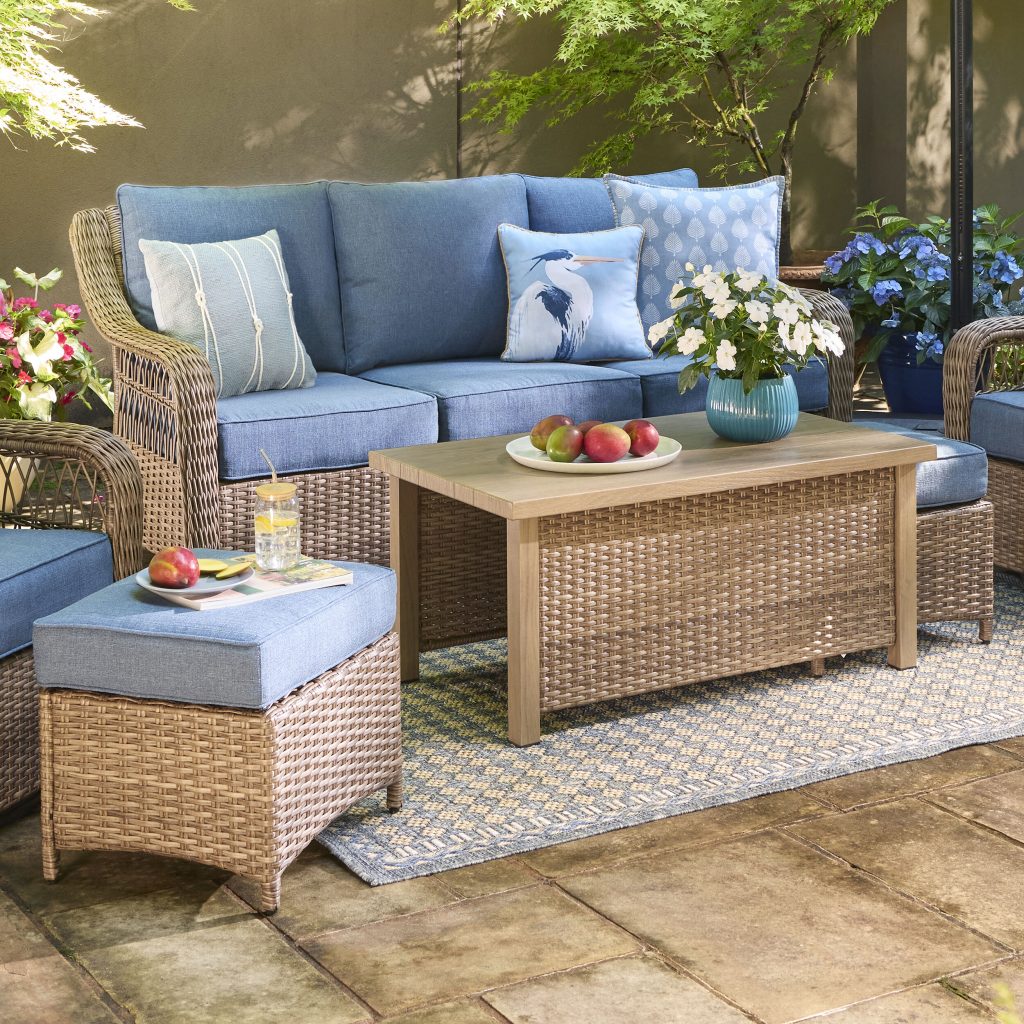 Allen + Roth Grand Haven 4-piece wicker set with blue cushions: sofa, table and two ottomans