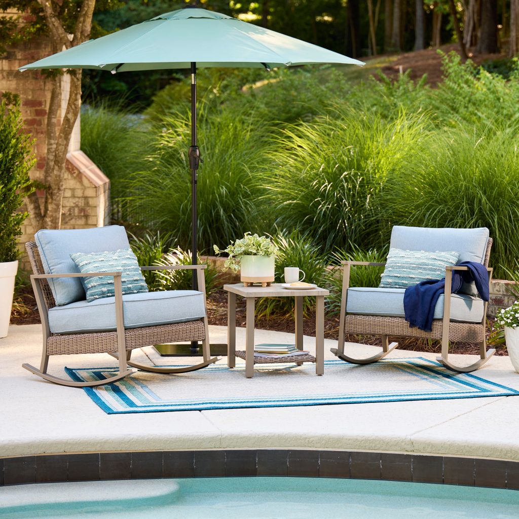 allen + roth Ivy Meadows wicker patio set with two rocking chairs, blue cushions and a small side table