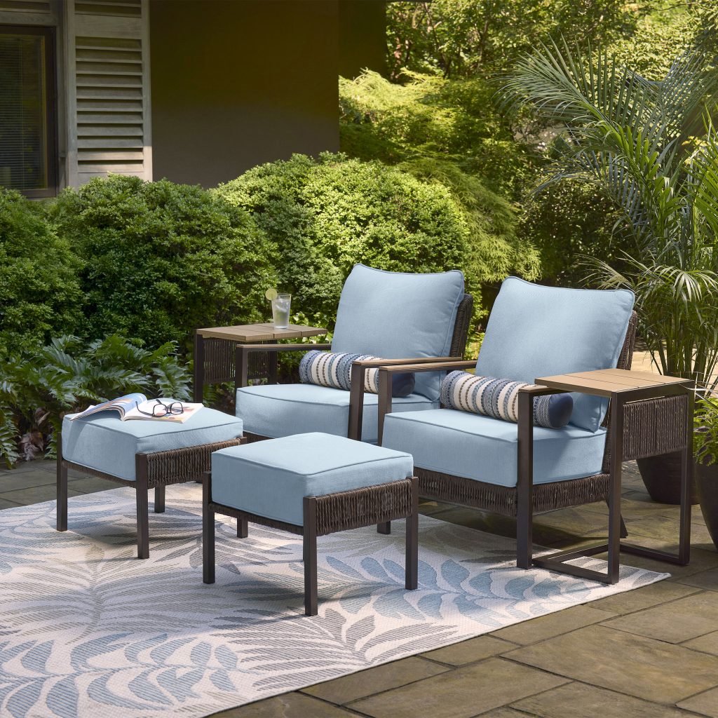 Allen + Roth Ashford 6-piece brown wicker patio conversation set with blue cushions, two chairs, two ottomans and two side tables
